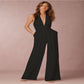 Sleeveless halter jumpsuit.